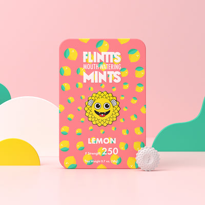 Flintts Lemon Mints tin with pink background and lemon illustrations, F-Strength 250.